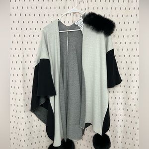 Brand new, no tags, never worn. Joseph Ribkoff poncho one size. faux fur Pompoms